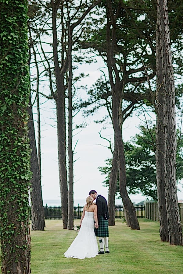 bride and groom kissing photographer ayrshire