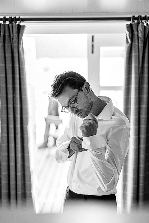 groom getting ready for wedding at the lodge on loch goil 