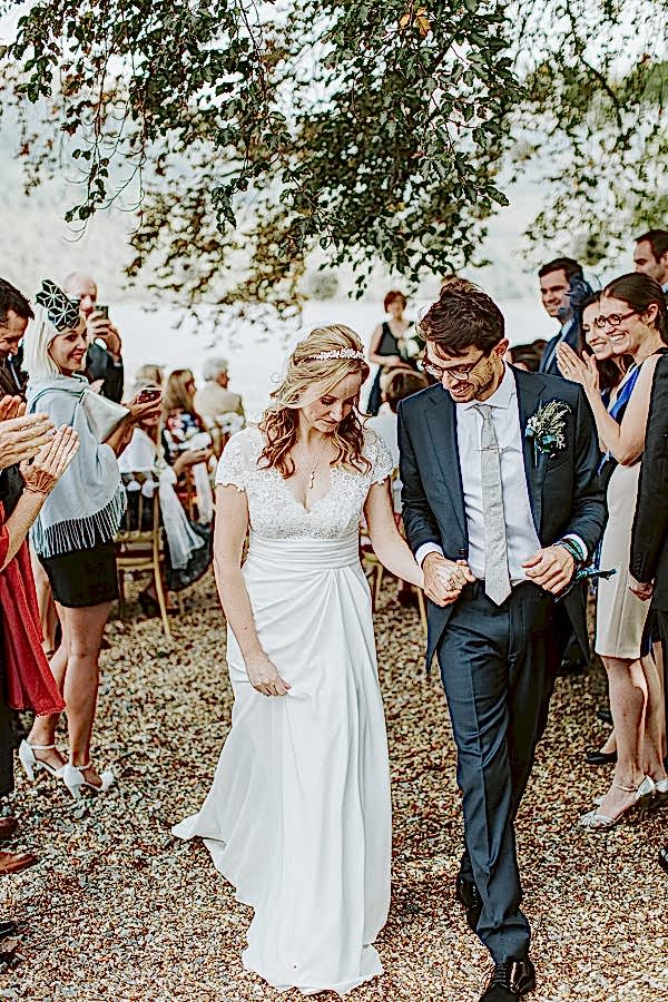 newlyweds walking down the aisle