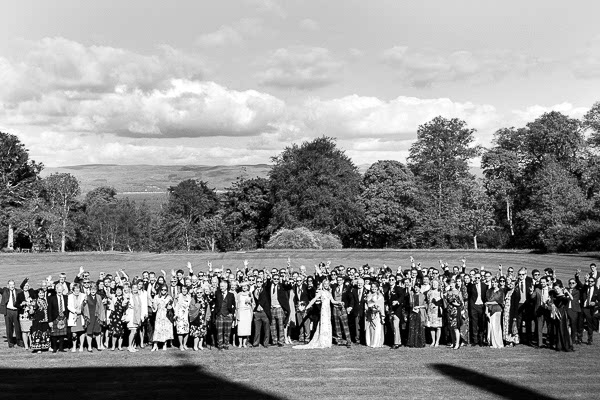 group photo on lawn at scottish wedding