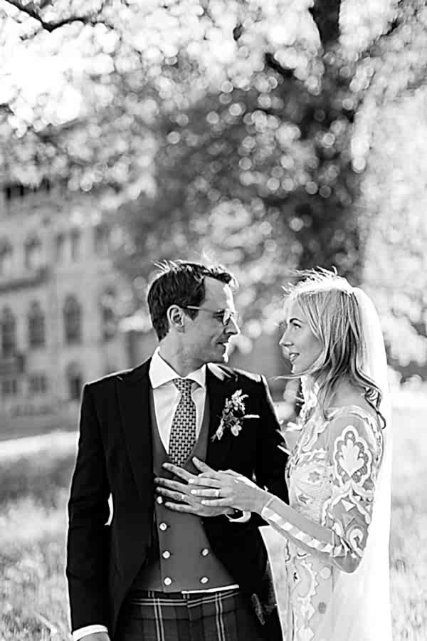 just married couple at mount stuart holding hands