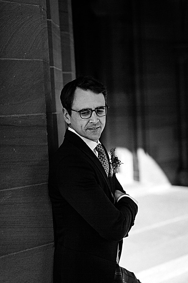 scottish groom portrait looking down
