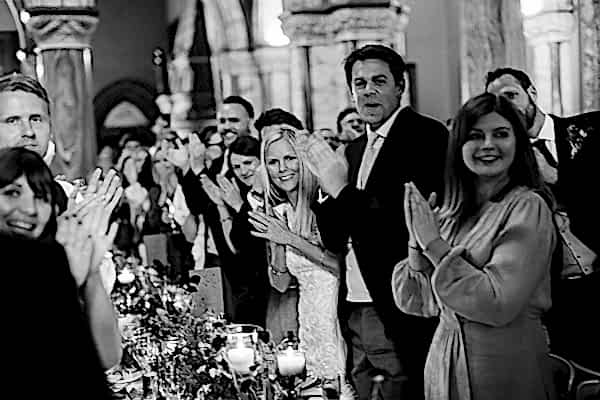 wedding guests clapping