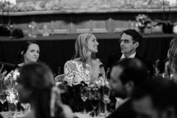 bride looking at groom during speeches