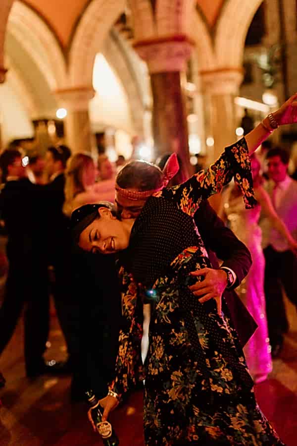  a couple dancing at reception