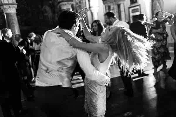 a couple dancing on a wedding reception