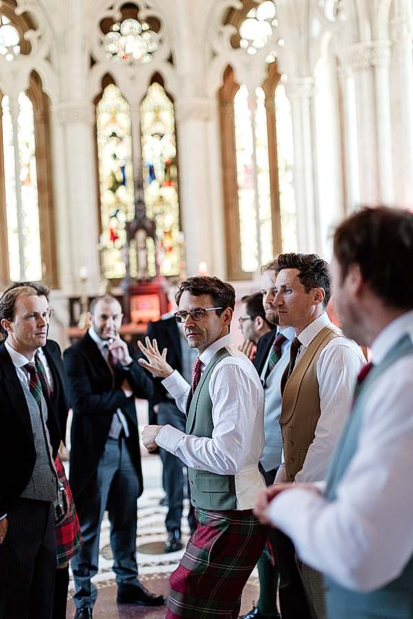 groom with groomsmen at chapel 