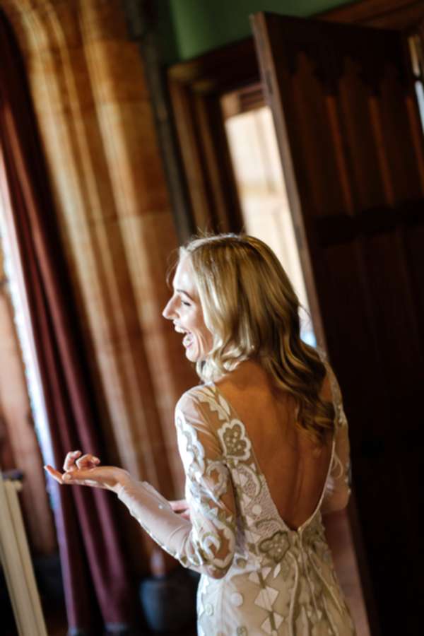 bride laughing waiting for ceremony
