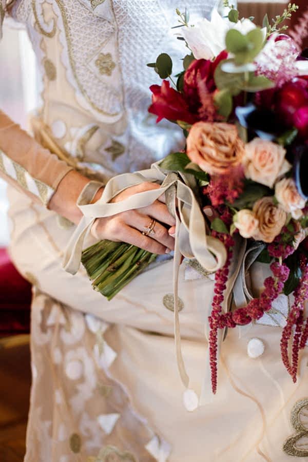egagement ring with flowers on bride