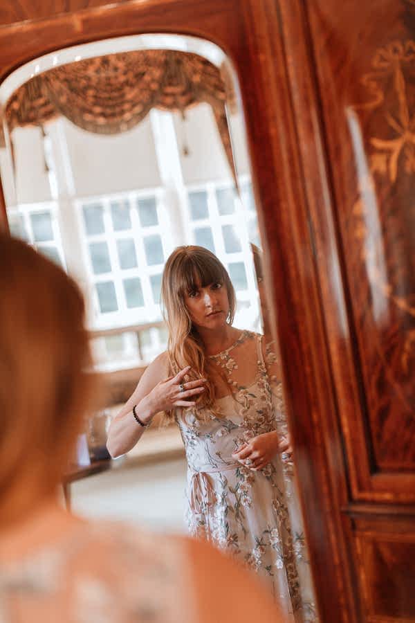 brides sister in the mirror wedding venue Glenapp Ayrshire