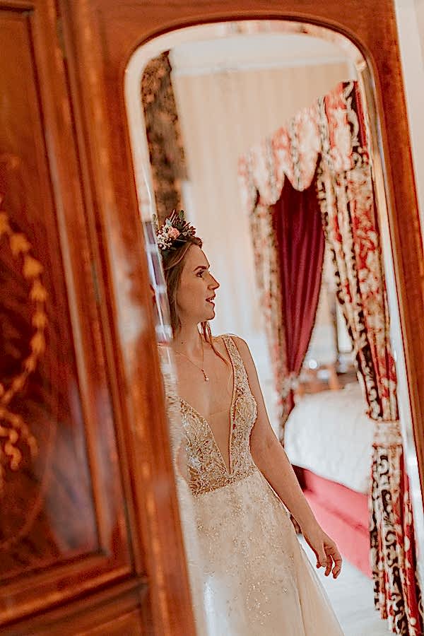 beautiful bride in the mirror at the wedding in Glenapp Castle