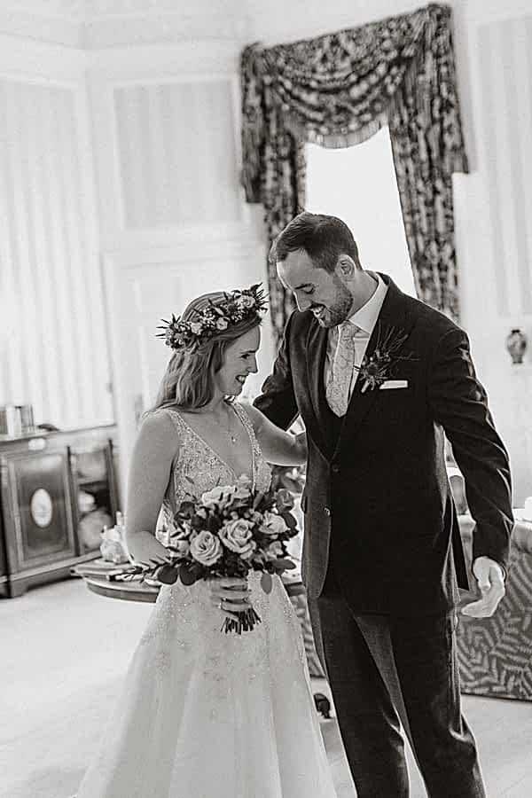 bride and groom happy at the frist glance at Glenapp Wedding Venue