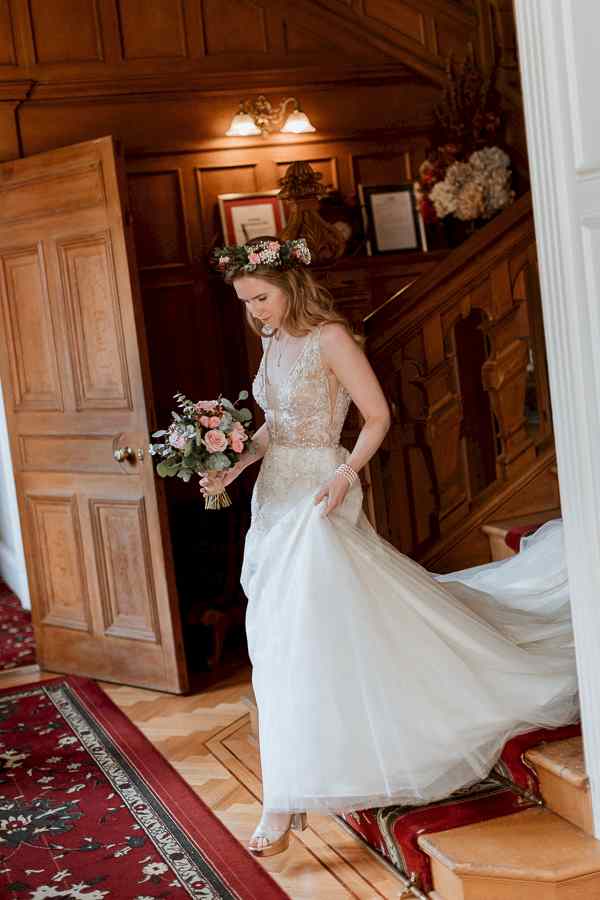 Bride walking down the steps at Glenapp  Wedding Venue Scotland