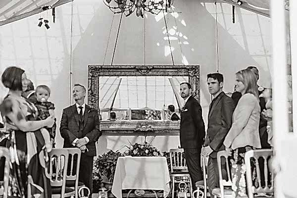groom awaits the bride to arrive at green house Glenapp Castle 