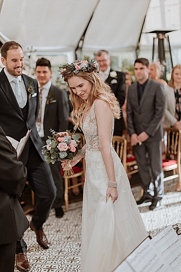 bride and groom at the j8manist ceremony Glenapp Wedding Venue 