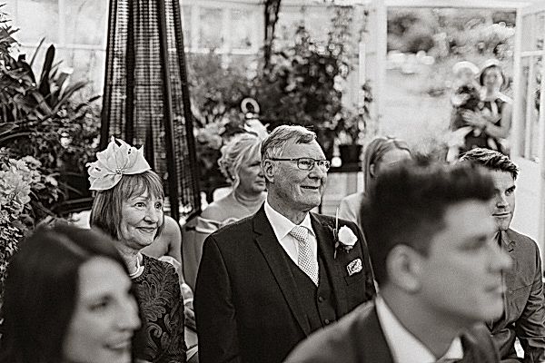 grooms parents happy at hte humanist ceremony in Glenapp Greenhouse