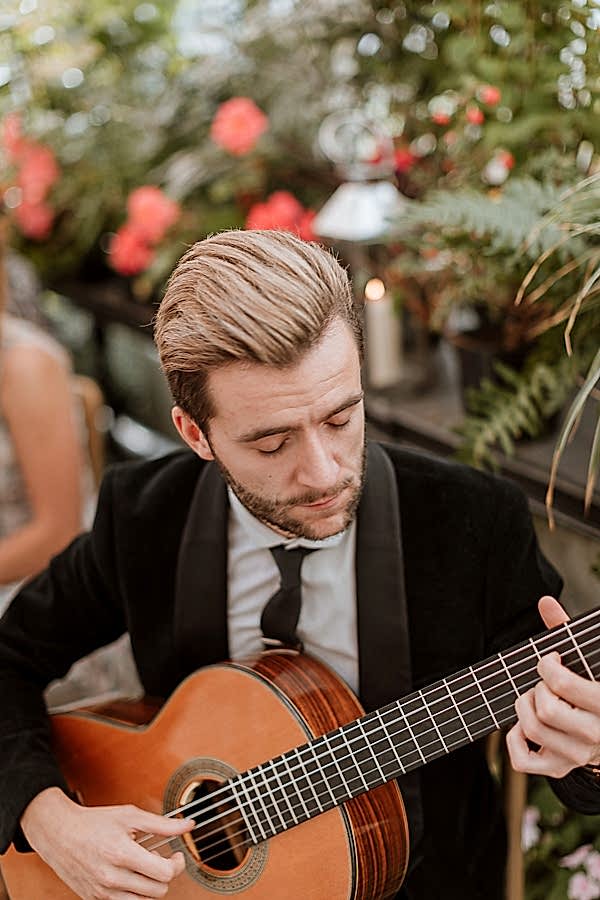 guitar player at Glenapp Castle Wedding Photograpy Scotland 