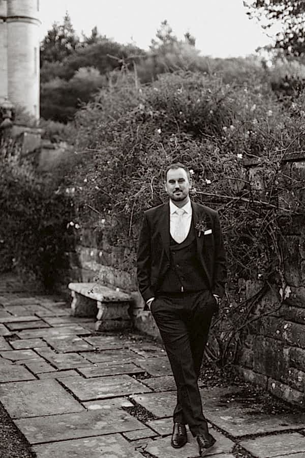 groom posing in the Glenapp Estate gardens 