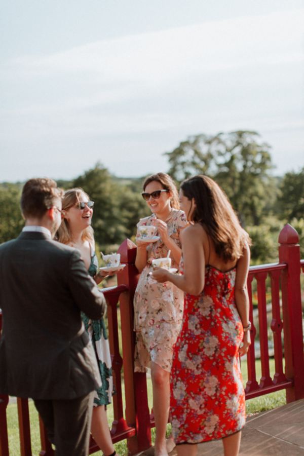 welcome party at dumfries house guests laughing