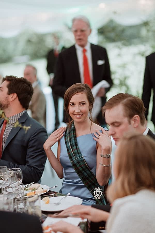 bride smiling at the table