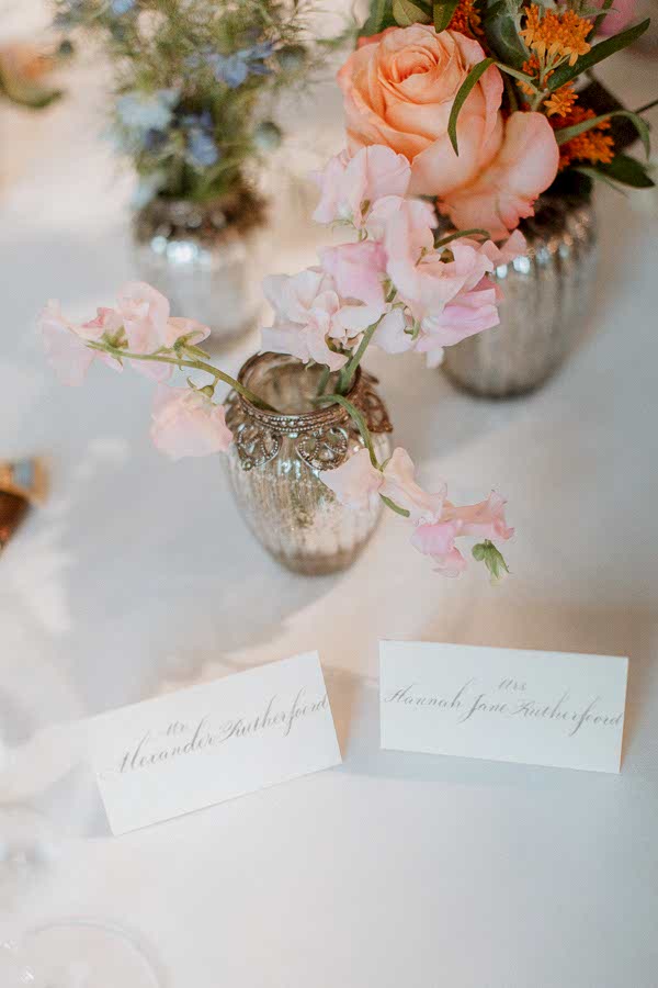 flowers and name cards at dumfries house wedding