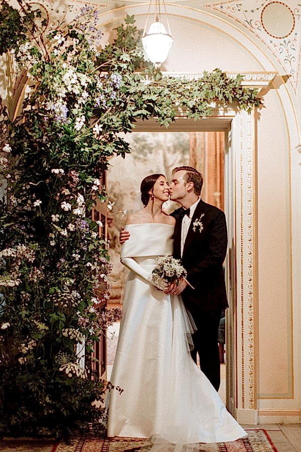 Dumfries House Wedding Photos bride and groom kissing by the door