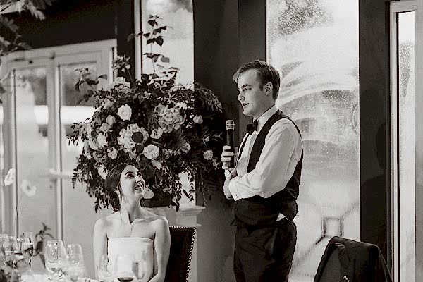 groom giving a speech during wedding 