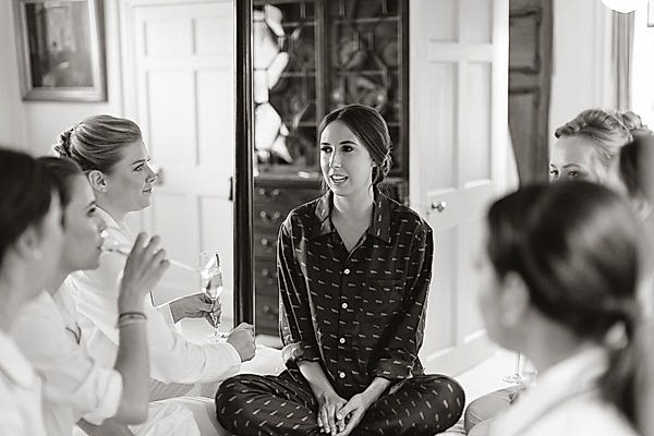 bride talking to her bridesmates