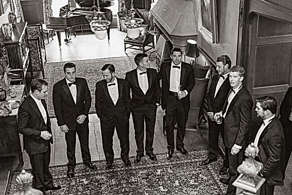 all groomsmen with groom in toxidos