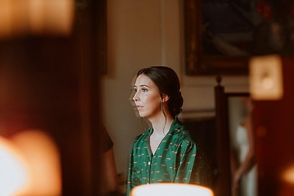brides portrait during preparations reflexion in mirror