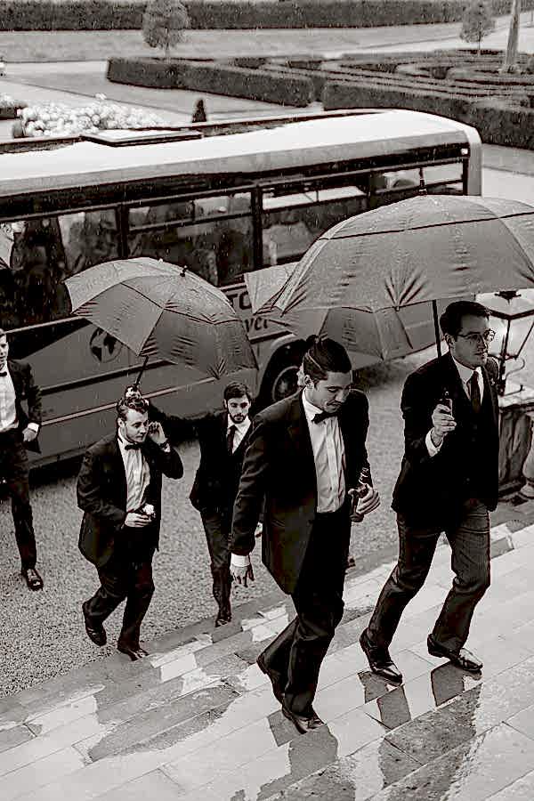 grooms party arriving in rain to Dumfries House 