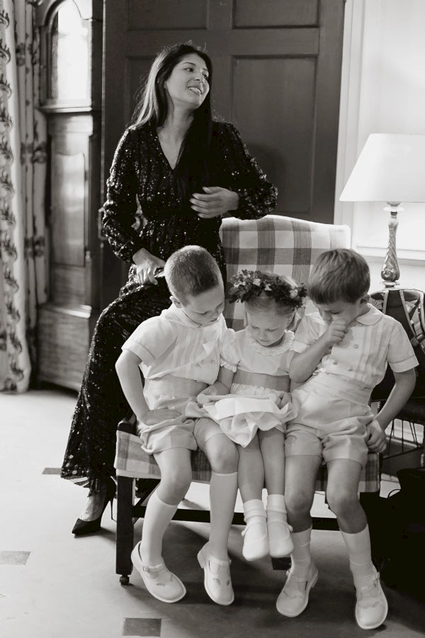 kids sitting on an armchair