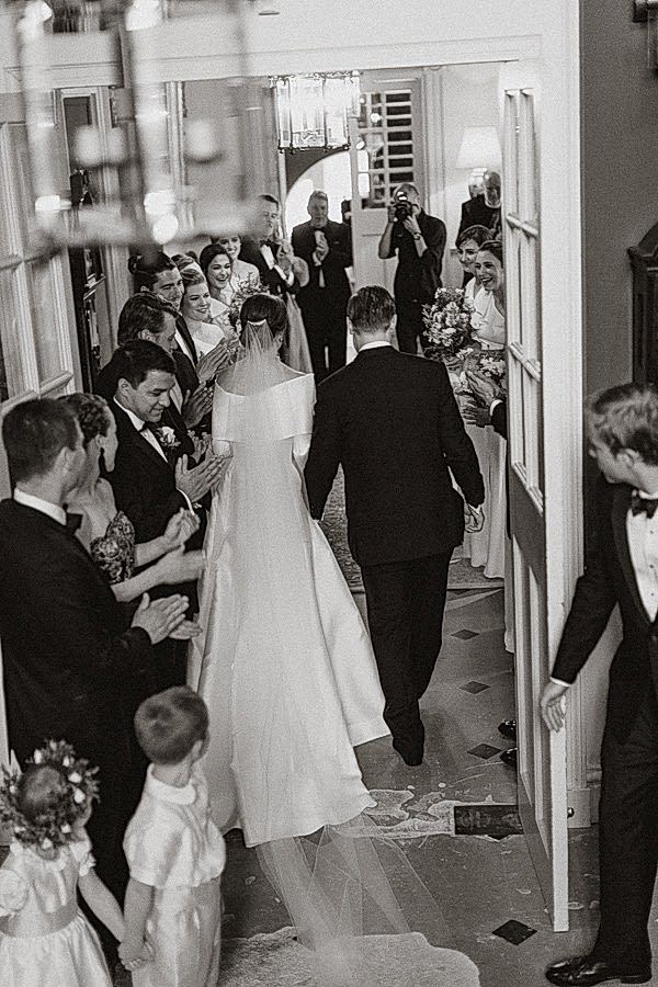 bride and groom wlaking together to ceremony