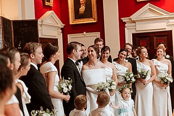 bridal party bride and groom looking at each other