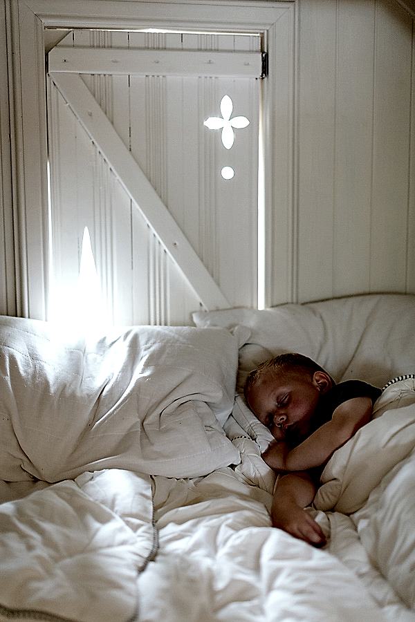 child sleeping in the summer house on the wedding day scotland 